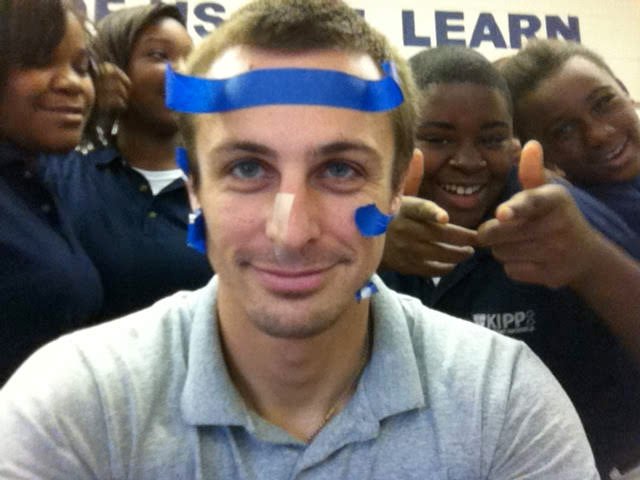 Adam Holdren with students during his early teaching years